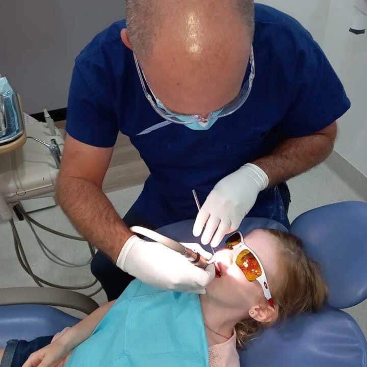 Dentist Checking The Child's Teeth